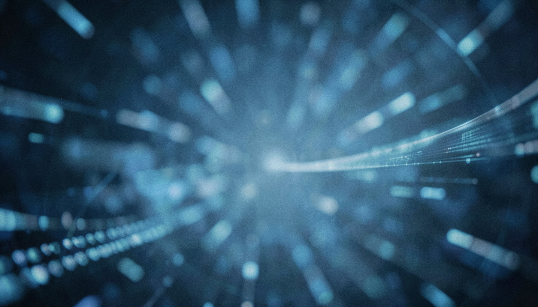 A wide cinematic frame with shallow depth of field showing soft blue-gray abstract data patterns and subtle light streaks