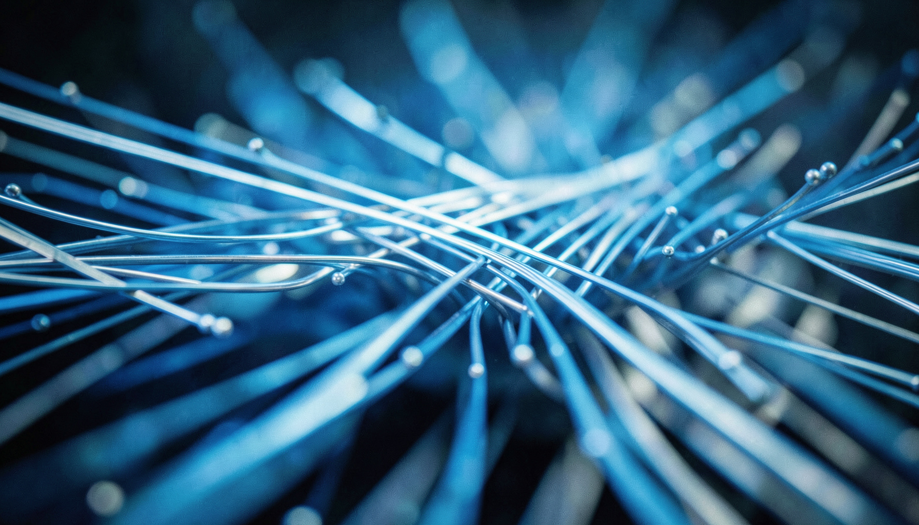 Abstract visualization of parallel computing data flows with cool blue and silver tones, soft focus, wide cinematic frame